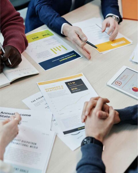 Business professionals reviewing company setup documents